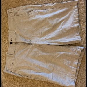 Pinstripe khaki shorts.